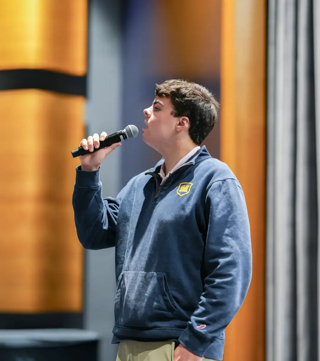 Student singing in PAC