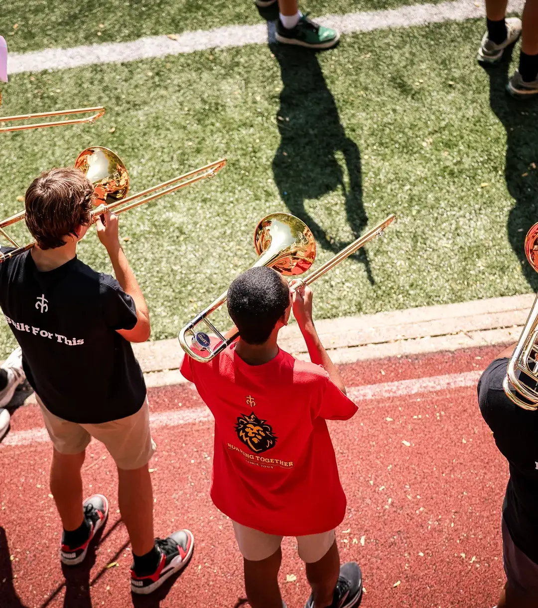 Band students playing at MoeGate
