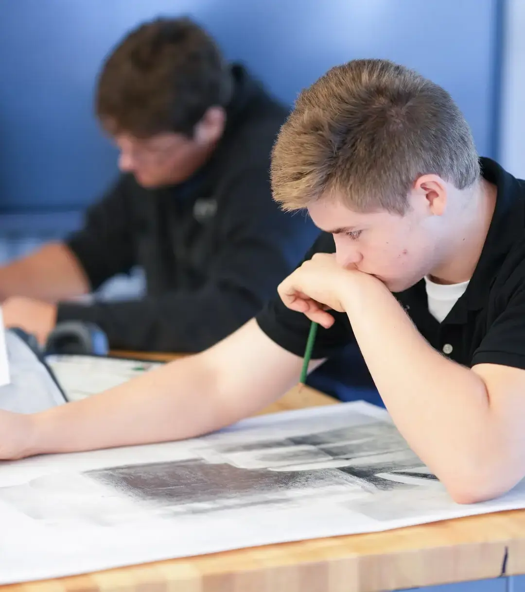 Moeller student drawing in design class