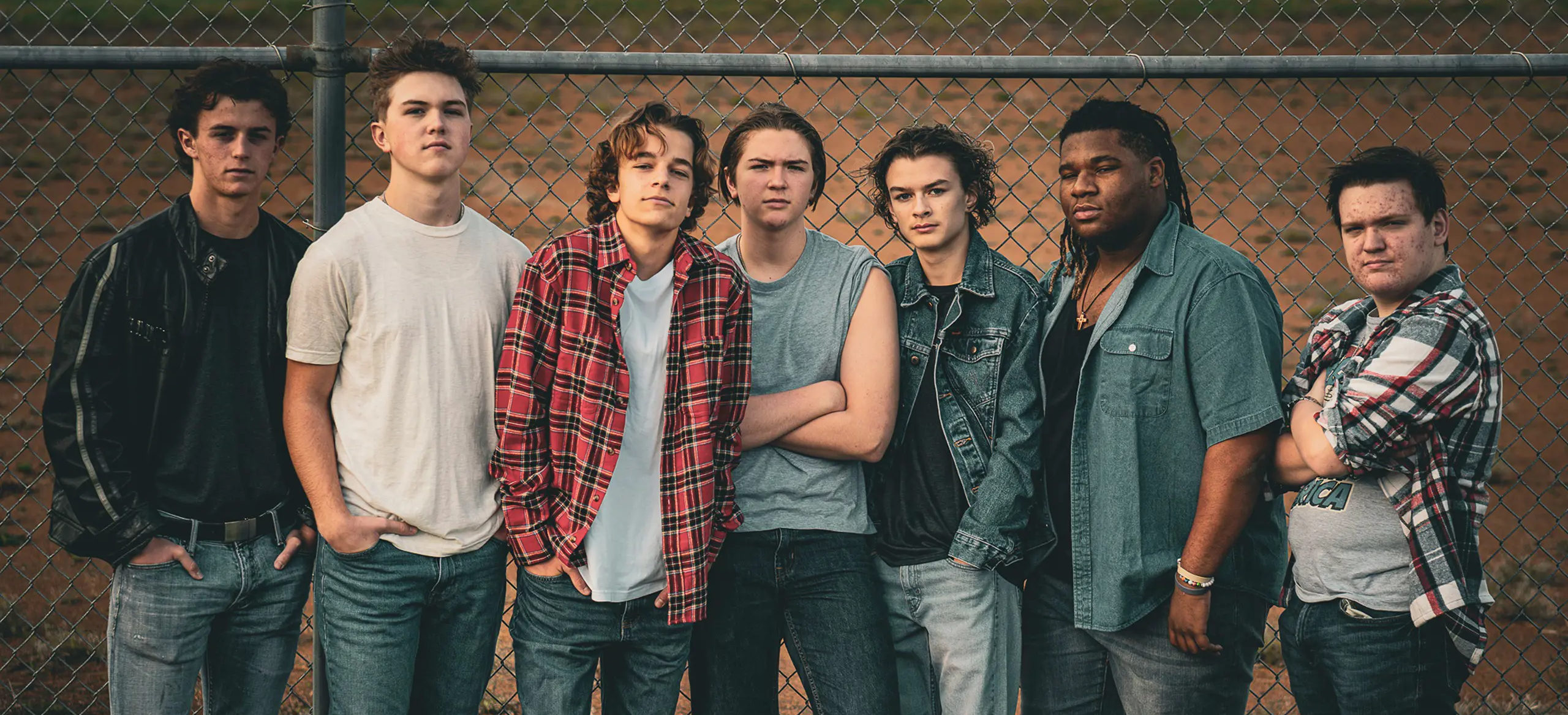 Cast photo of the fall play Outsiders