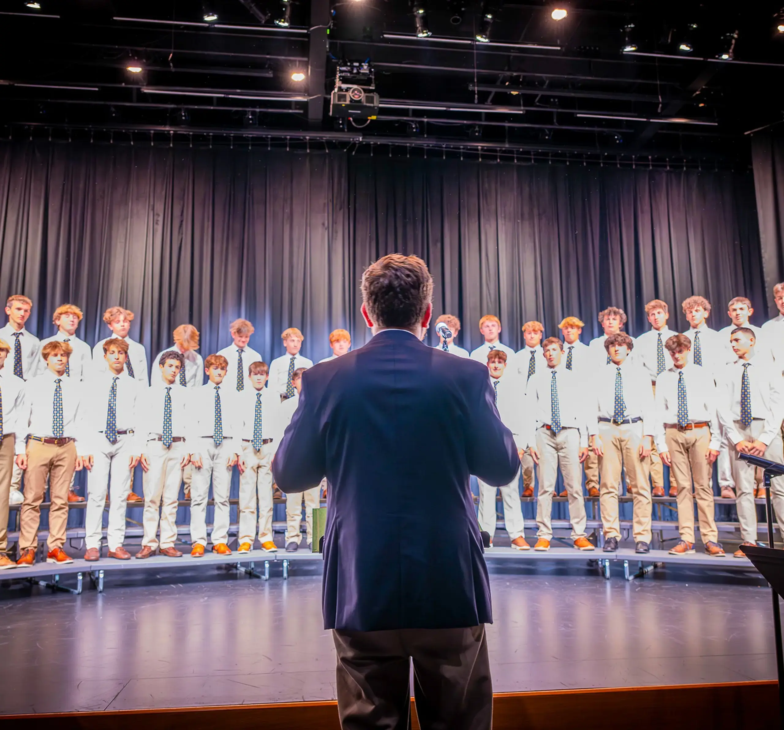 Students singing at the fall chorus concert