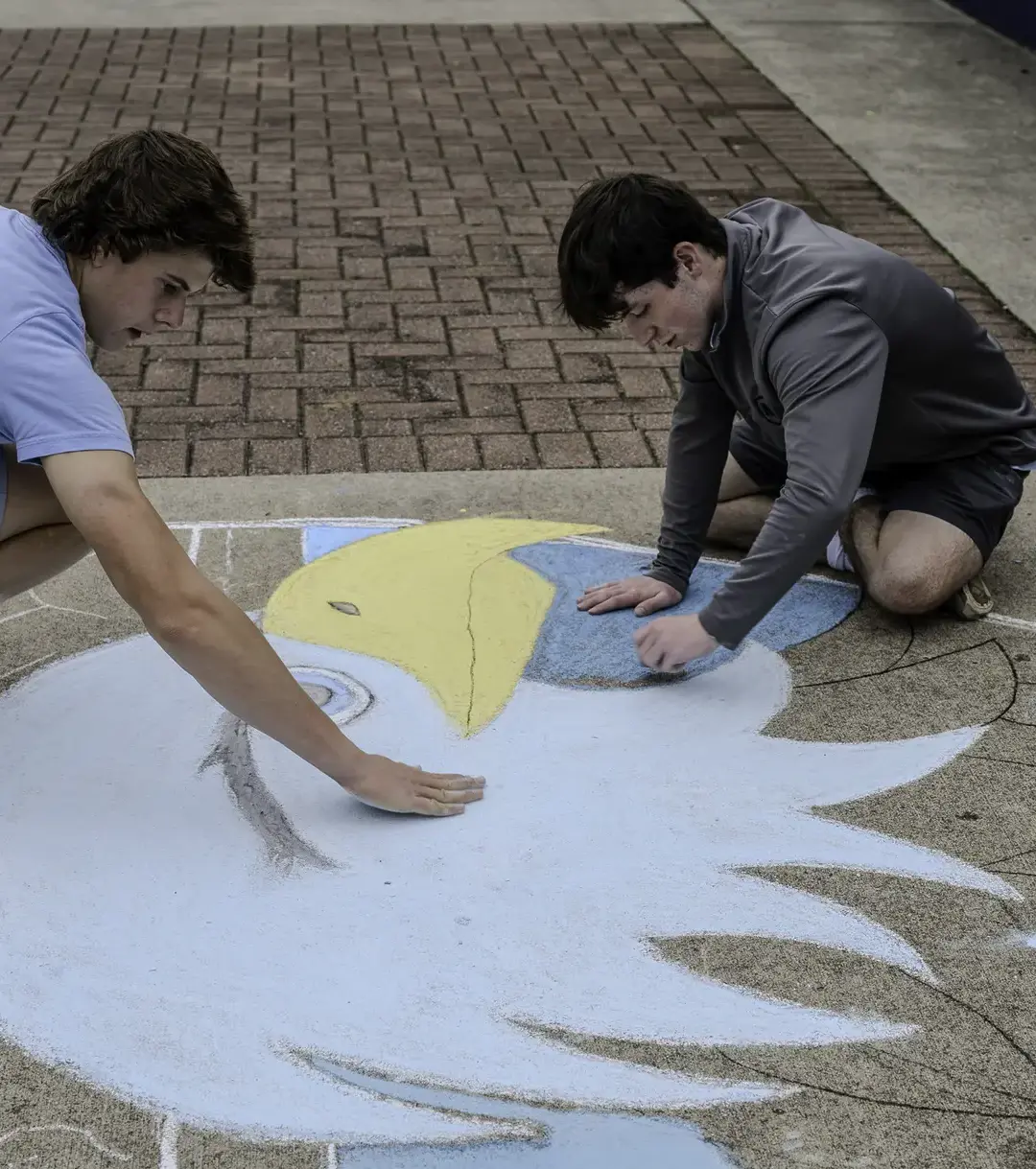 Eveslage students creating at the chalk art competition