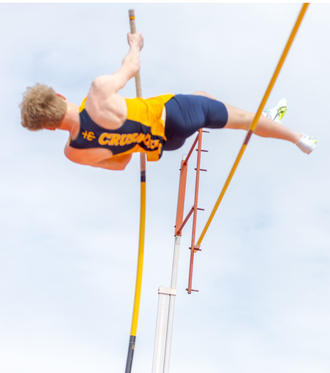 Student pole vaulting