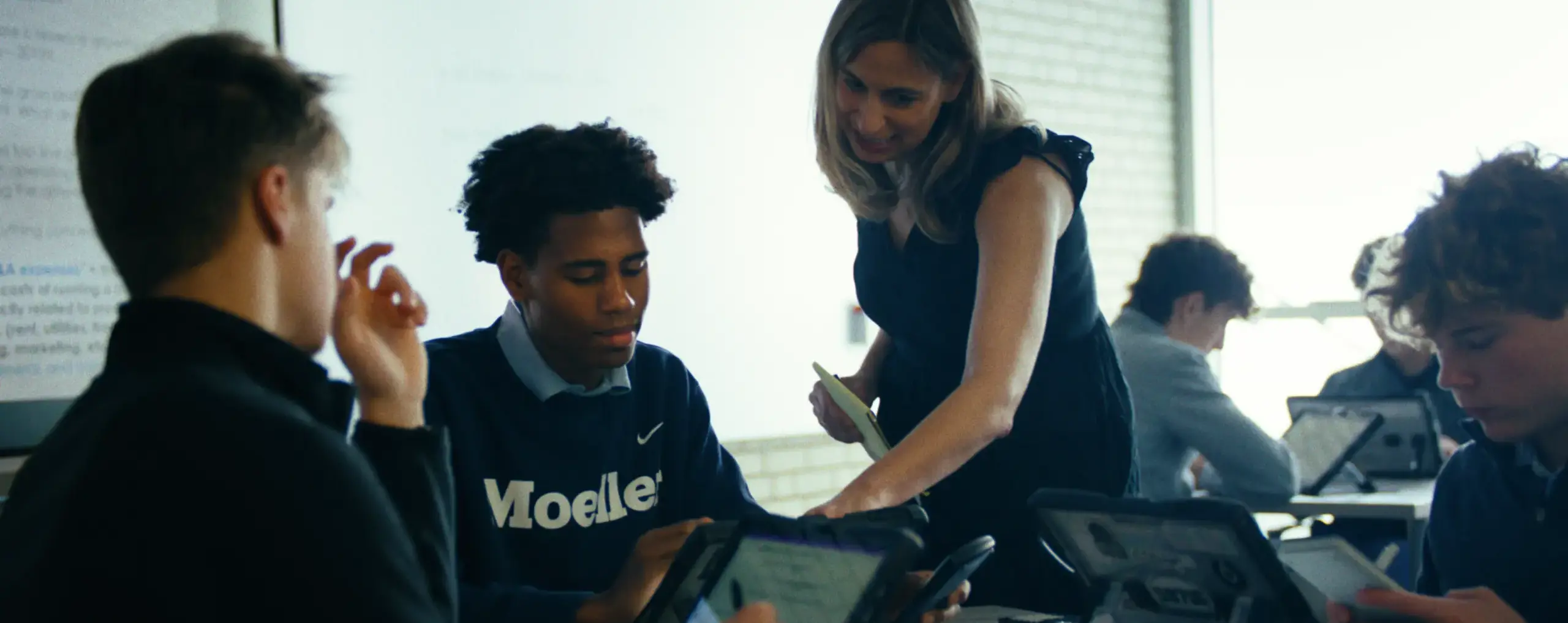 Mrs. Tlucek in class with students